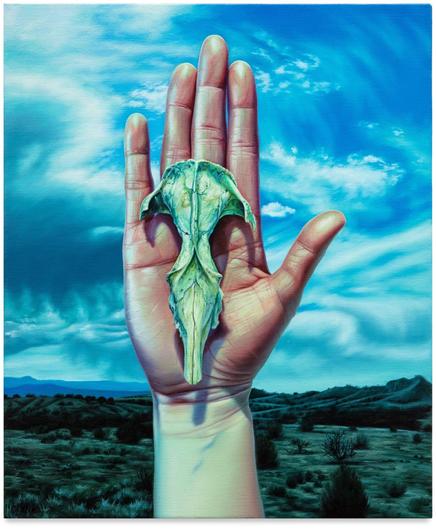 an oil painting of a woman's hand holding an opossum skull in her palm set against a Western landscape with dramatic clouds