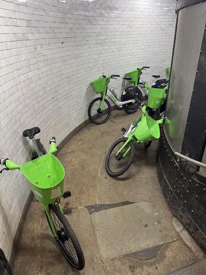 I'm getting really sick of Lime bikes blocking every footpath in this city. This is the state of Greenwich Foot Tunnel