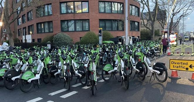 Photo shows dozens of 'dumped' Lime bikes in London