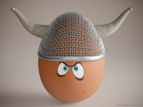 Brown hens egg with a grill helmet with small horns and serious cartoon eyes on the front of the egg.